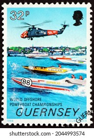 GUERNSEY - CIRCA 1988: a stamp printed in Guernsey shows boats, helicopter and St. Johns Ambulance rescue ship, 1988 World Offshore Powerboat Championships, circa 1988