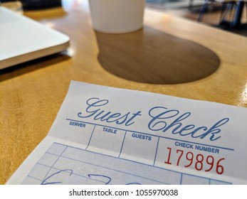 Guest Check On The Table