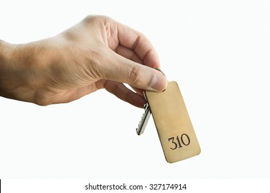 Guest Holding The Hotel Room Key Isolated On White Background