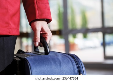 Guest Receiving Help From Hotel Bellhop.