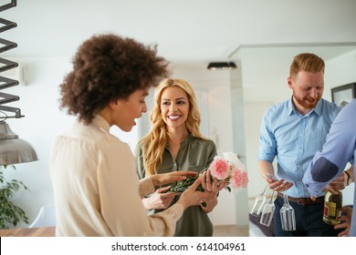 Guests come to visit and see new house. - Shutterstock ID 614104961