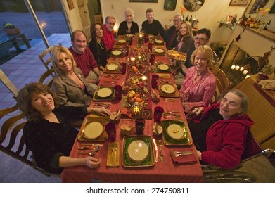 Guests At An Elegant Thanksgiving Dinner Party