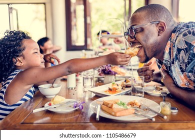 Guests Having Breakfast At Hotel Restaurant