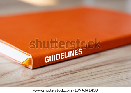 Guidelines book on wooden table