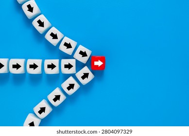 guiding arrows to one object. isolated on blue background. leadership concept. teamwork and cooperation to achieve goal