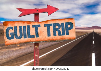 Guilt Trip Sign With Road Background