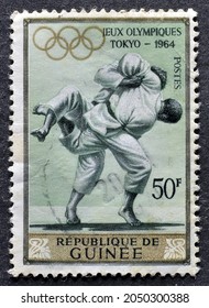 Guinea - Circa 1964 :Cancelled Postage Stamp Printed By Guinea, That Shows Judo, Promoting Summer Olympics In Tokyo, Circa 1960.