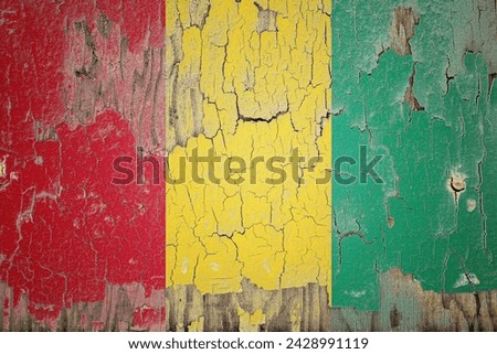 Guinea flag and paint cracks. Prison concept with border image. Guinea is currently heading toward recession. Inflation. employment. economic recession. Double exposure hologram