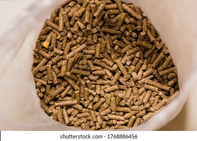 Guinea Pig Food In A Bag, Dry Pellets. Close Up.