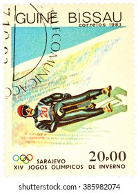 GUINEA-BISSAU - CIRCA 1983: Stamp Printed In Guinea-Bissau Shows Toboggan, Devoted To The 14th Winter Olympics In Sarajevo, Series, Circa 1983