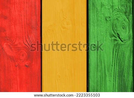 Guinean flag represented in colored timber planks