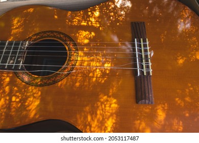 Сlassical Guitar With A Broken String Close-up