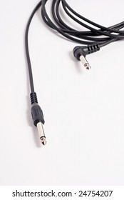 Guitar cable on a white background