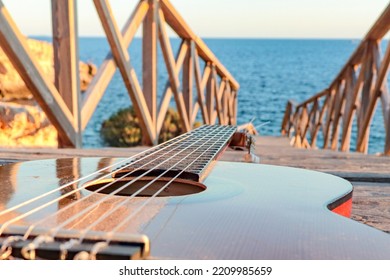 Guitar Close Up On A Bridge