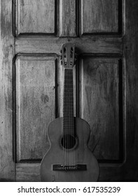 Guitar at the door
					