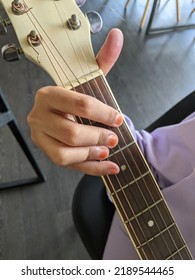 Guitar And Hand Close Up Concept