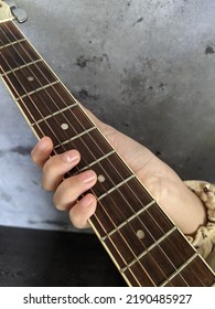 Guitar And Hand Close Up Concept