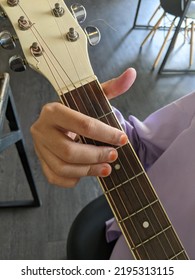 Guitar And Hand Close Up Concept