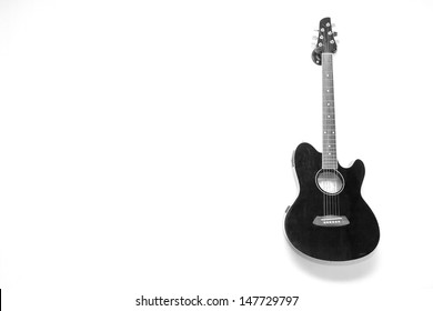 The Guitar Hanging On The  Wall