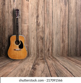 Guitar in old room.