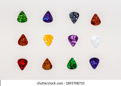 Guitar picks pattern. top view. Music background