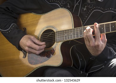 Guitar Playing/close Up Of A Country Western Guitarist