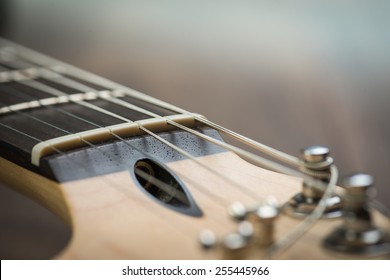 Guitar Riff With Strings And Tuning Knobs