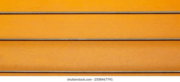 Guitar string close-up on guitar background
