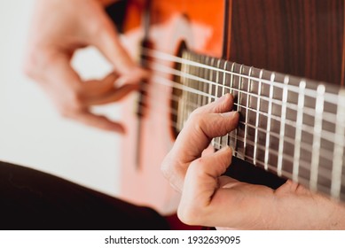 Guitarist On Acoustic Guitar Close Up