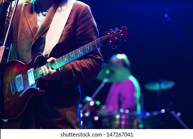 Guitarist on stage - Shutterstock ID 147267041