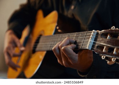 Guitarist Playing Guitar In Studio - Powered by Shutterstock