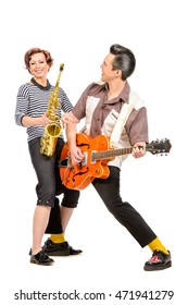 Guitarist And Saxophonist Duo In The Style Of The 60s. Rock'n'roll, Jazz. Beat Generation. Isolated Over White. 