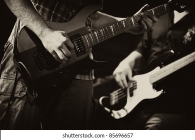 Guitarists Of A Rock Band With A Guitar