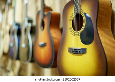 Guitars Hanging On A Wall