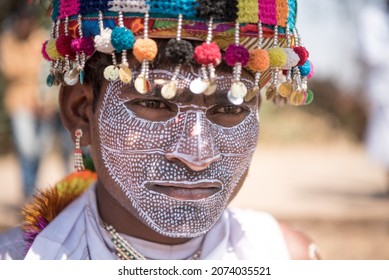 GUJARAT - INDIA - March 14, 2017: Rathva tribal man with painted face and in traditional dress participate in the annual tribal Holi festival at Kawant village near Vadodara.