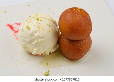 Gulab Jamoon Traditional Indian Sweet Dessert Served With Ice Cream 