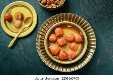 Gulab Jamun In Sugar Syrup, Indian Sweet Food For Diwali Festival. India Festivals Like Dussehra Holi Ganesh Chaturthi Ram Navmi Ramadan Pakistan India Sri Lanka Kerala