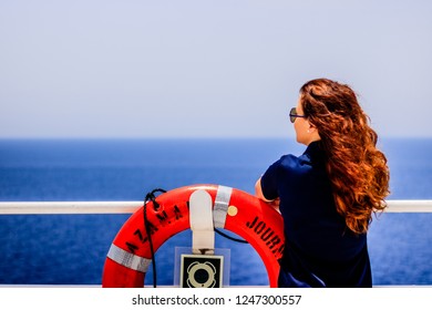 Gulf Of Aden, Indian Ocean - 2018.
Portrait Of Young Woman Looking At The Endless Sea.