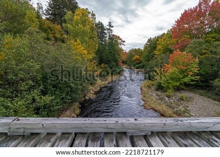 Gulf Hagas in the northen Maine Woods as the Pleasant River is surrounded by early fall foliage  [[stock_photo]] © 
