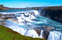 Gullfoss, Iceland - May 30 2019:  Golden Ring Area,  View Of The Gullfoss Waterfalls With Visitors On The Left