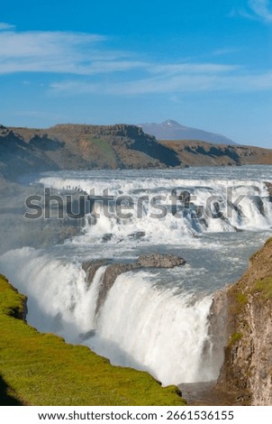 Gullfoss is two separate waterfalls; the upper one has a drop of 11 meters and the lower one 21 meters.  In south Iceland.