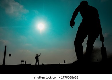 Gully Cricket Boys Playing In Beach During Summer Holidays 