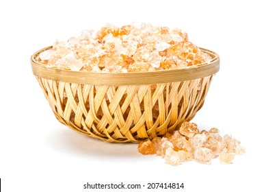 Gum arabic pieces in wooden basket