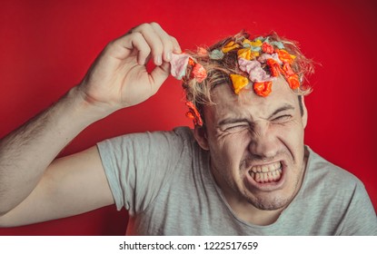 Gum In His Head. Portrait Of Man With Chewing Gum In His Head. Man With Hair Covered In Food. Closeup Portrait Of An Angry  Man Who Has Opened A Tin Of Food  And It Has Ended Up In His Hair , Red Back