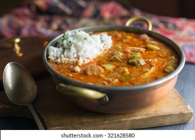 Gumbo With Rice In A Copper Pot. 