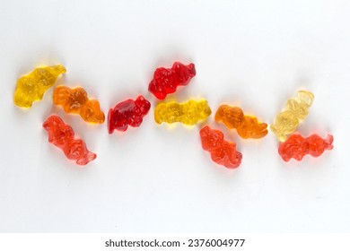 Gummies are a type of candy that is typically made from gelatin, sweeteners, and flavorings. They come in various shapes, sizes, and flavors and are often chewy and colorful.