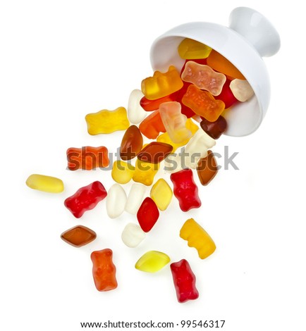 gummy bear candies in a bowl isolated on white
