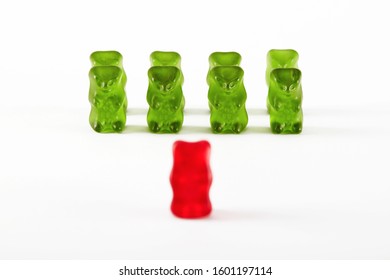 Gummy bear candies designed as a military troop. Commander leader inspecting the troops. 