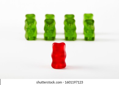 Gummy bear candies designed as a military troop. Commander leader inspecting the troops. 