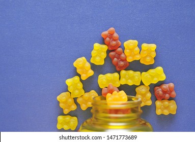 Gummy Bear Vitamin On Blue Background.
